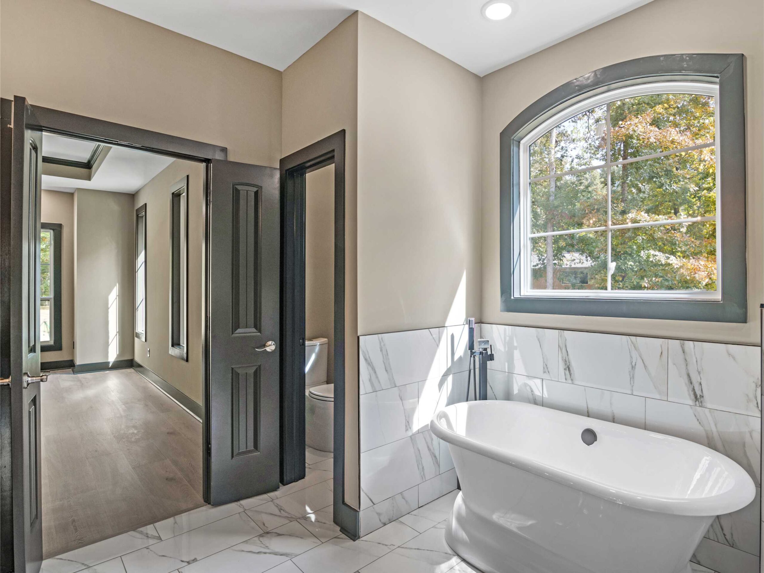 Lake house guest wing designed to comfortably host extended family