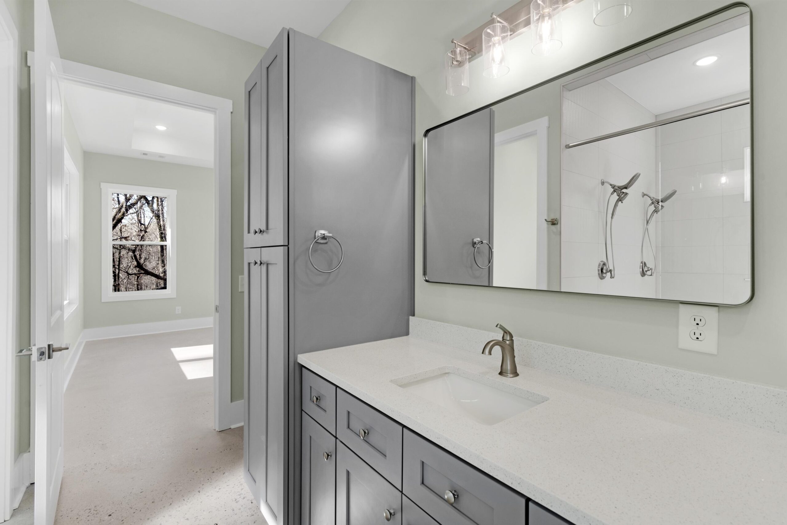 J&J Custom Homes reviewing floor plans and site conditions during a paid planning phase